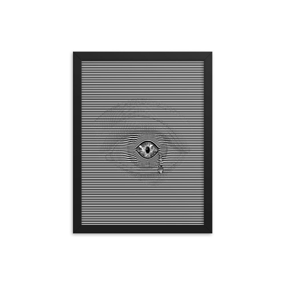 Black and white image featuring a realistic eye with a tear drop, set against a silhouette of the surrounding area of the human eye, creating an illusionary effect. Size: 12x16 inches, framed in black.