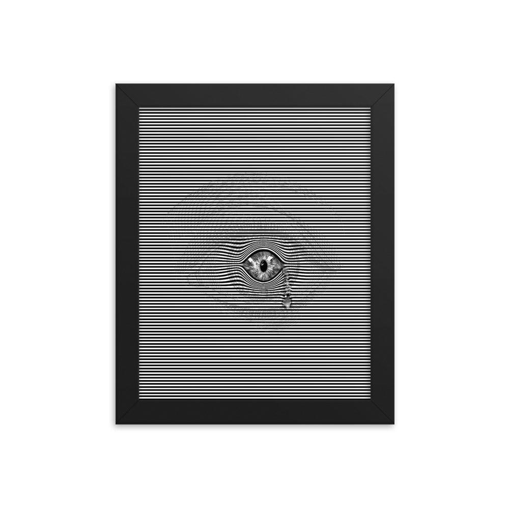 Black and white image featuring a realistic eye with a tear drop, set against a silhouette of the surrounding area of the human eye, creating an illusionary effect. Size: 8x10 inches, framed in black.